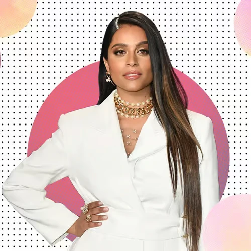 lilly-singh-comedian-actress-youtuber Lilly Singh, Canadian comedian, actress, and former YouTube creator, posing in a stylish white outfit