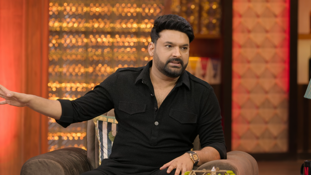 kapil-sharma-indian-standup-comedian-talk-show-host Indian comedian and television host Kapil Sharma speaking on the set of his comedy talk show