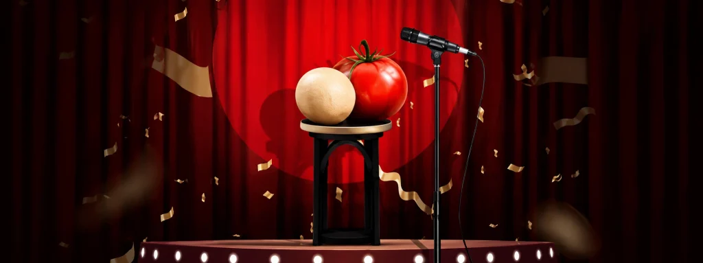 A comedy stage banner with a microphone and a tomato, representing the importance of proper corporate comedy show planning to avoid a tough crowd