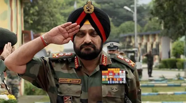 General Bikram Singh in Indian Army uniform, wearing a black turban and giving a salute