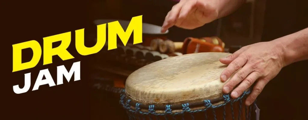 A close-up shot of hands playing a traditional djembe drum with the text "DRUM JAM" overlaid in bold yellow and white.