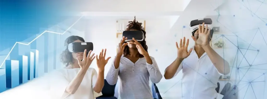 A diverse group of three professionals—a woman on the left, an African American woman in the center, and a man on the right—all wearing VR headsets and raising their hands as if interacting with a digital environment, set against a background showing a blue business growth chart on the left and a digital network overlay on the right.