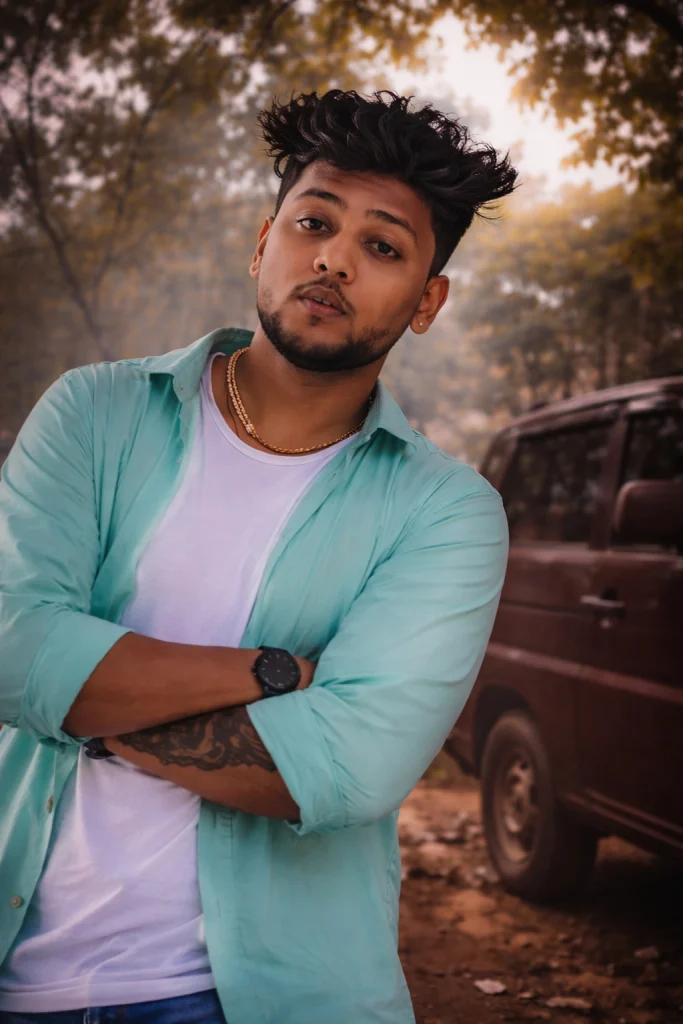 Promotional image for the Agri Koli rap song "Agri Haav" featuring artist Agri Baba in a mint green shirt.