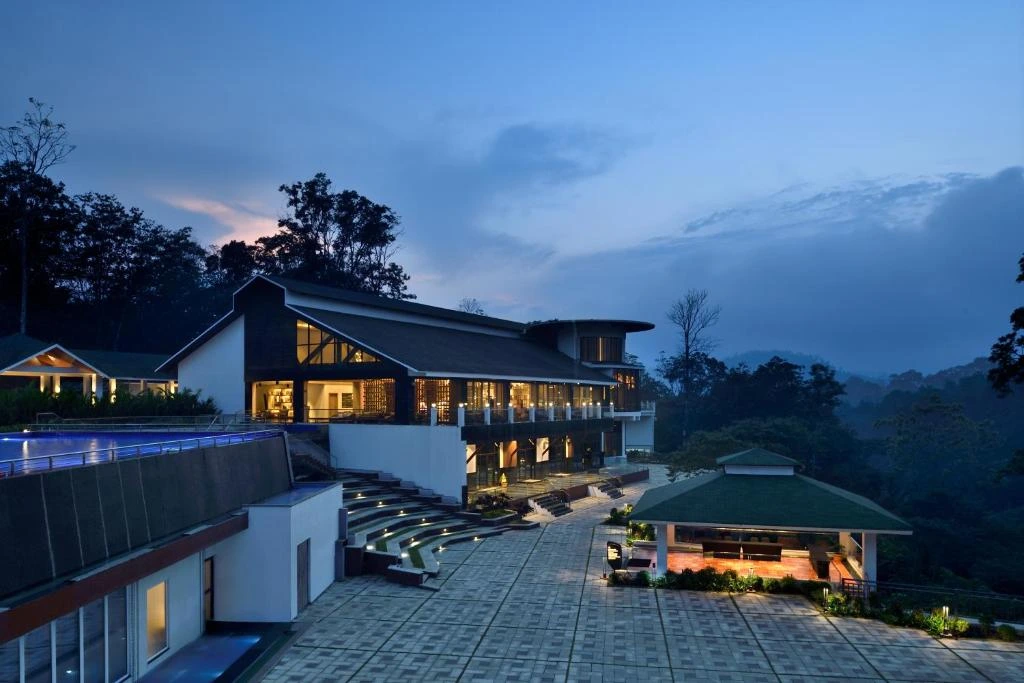 Evening view of Coorg Marriott Resort and Spa luxury property for corporate offstations and leadership retreats in Karnataka
