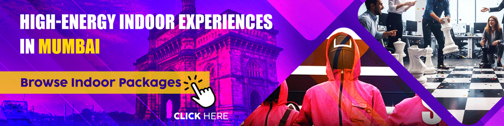 Corporate indoor team building in Mumbai with giant chess and themed activities against Gateway of India backdrop