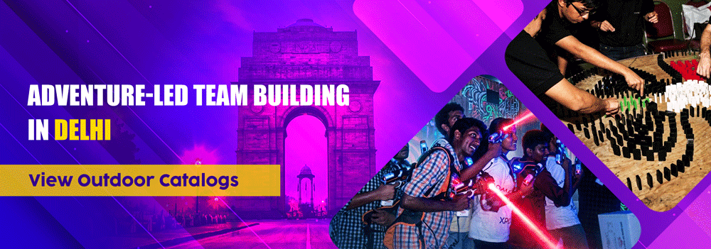 Corporate outdoor adventure activities in Delhi featuring laser tag and domino team challenge with India Gate silhouette