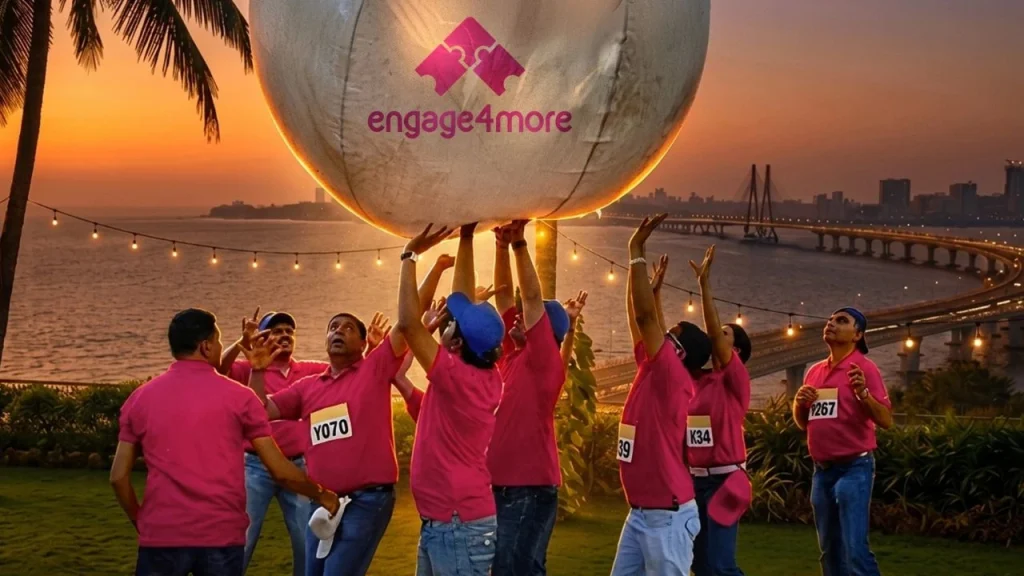 Top 5 Business Hotels in Mumbai for Strategic Team Building & CXO Meets A massive, elegantly lit luxury hotel ballroom in Mumbai set up for a corporate conference with hundreds of chairs, large chandeliers, and a stage.