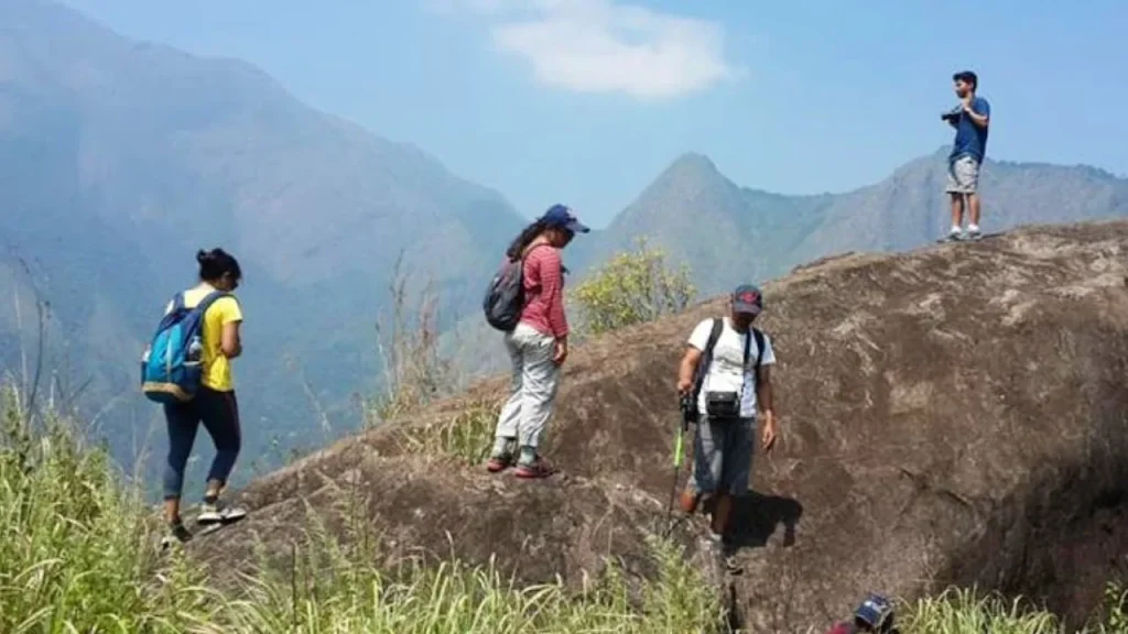 engage4more corporate offsite banner showing a luxury resort overlooking misty mountains and a safari group, symbolizing strategic decoupling and high-impact interventions near Bangalore