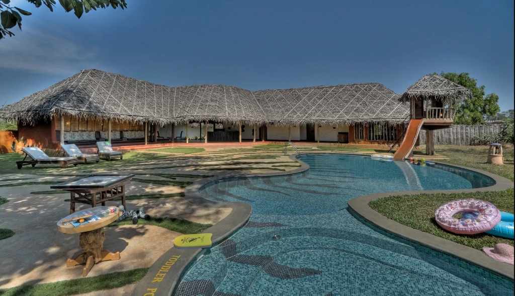 Luxury tribal-inspired pool villa at Evolve Back Kabini, ideal for corporate leadership retreats and vulnerable leadership sharing sessions