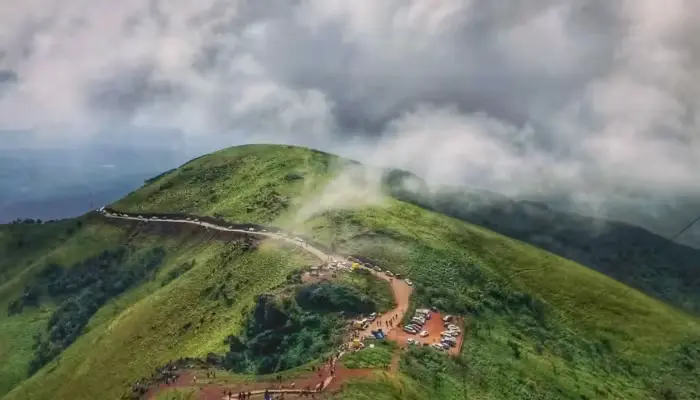 Aerial view of Mullayanagiri Peak in Chikmagalur, a premier destination for corporate strategy and innovation offsites near Bengaluru