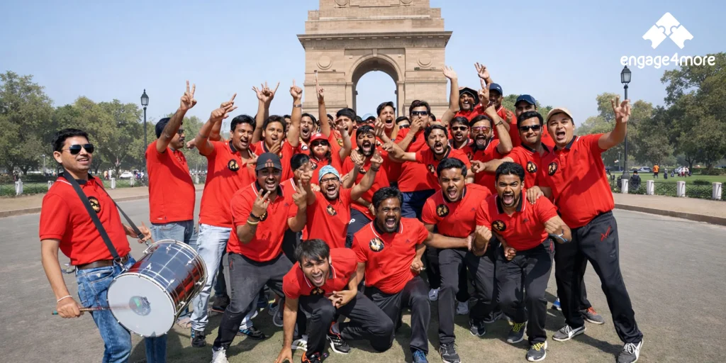 Why engage4more is the Top Team Building Company in Delhi NCR: 5 Premium Business Hotels for 2026 A scenic wide-angle view of the India Gate at sunset, with its grand archway illuminated and the surrounding lush lawns and water features reflecting the golden sky.
