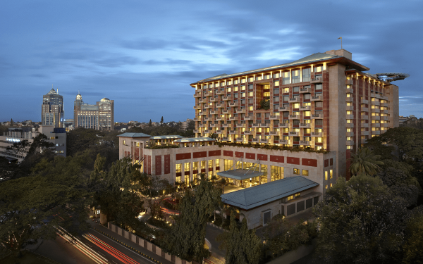 Night view of ITC Gardenia Bengaluru, a LEED Platinum luxury hotel for sustainable corporate offsites and high-end tech retreats