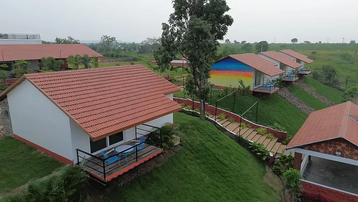 Eco-friendly cottages and hillside landscape at La Forest Resort Vikarabad